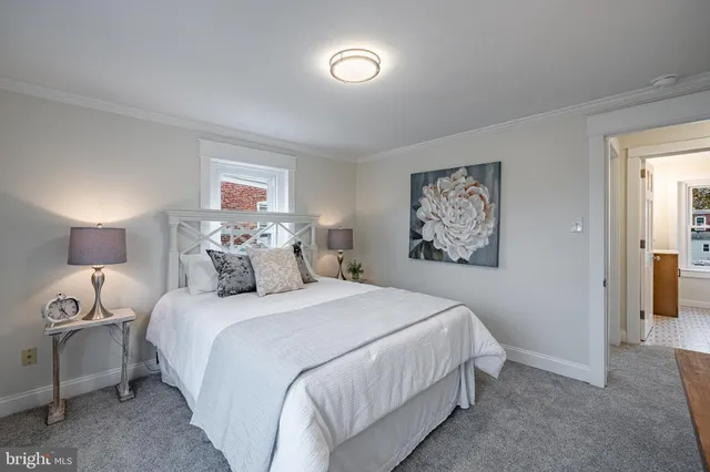 a bathroom with a bathtub sink and mirror