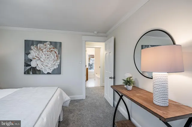 a bathroom with a sink and a window
