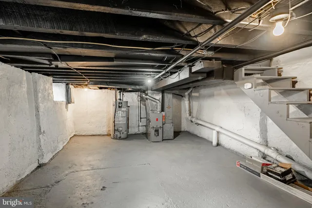 a view of a brick house with many windows