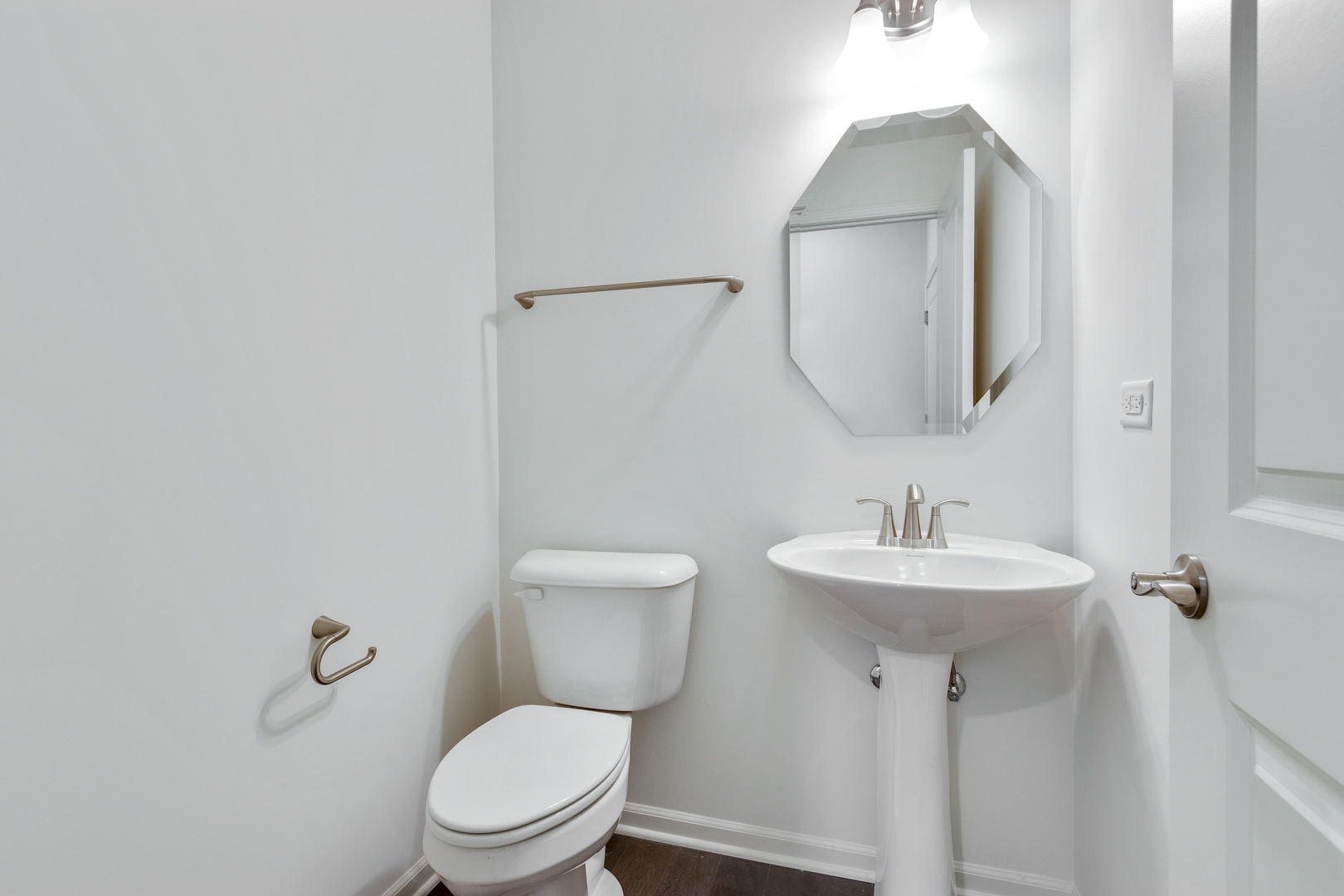 2065 Stuttle Road Batavia, IL 60510 - Photo 13 of 23 a bathroom with a toilet sink and mirror