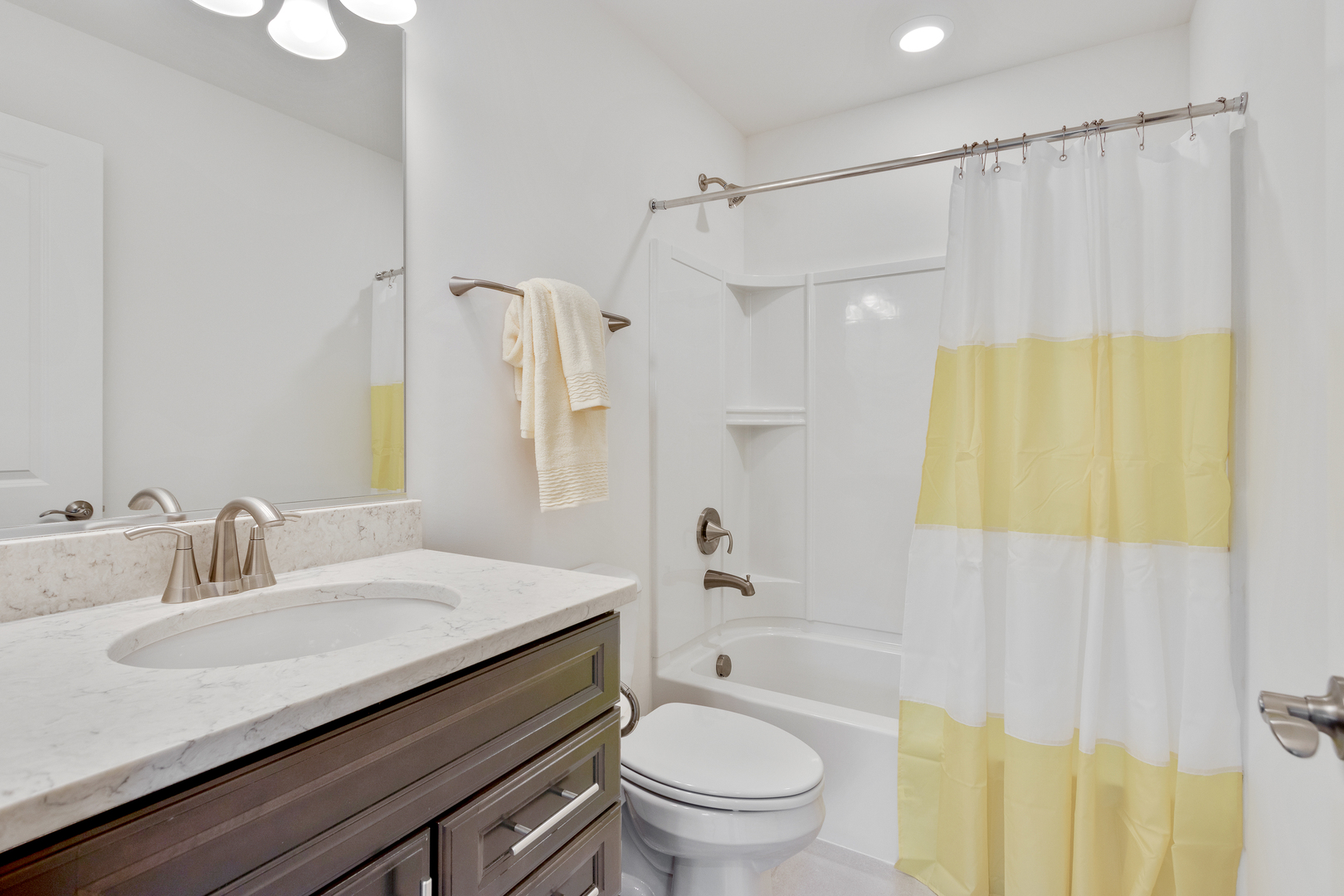 2065 Stuttle Road Batavia, IL 60510 - Photo 20 of 23 a bathroom with a granite countertop sink a toilet and shower