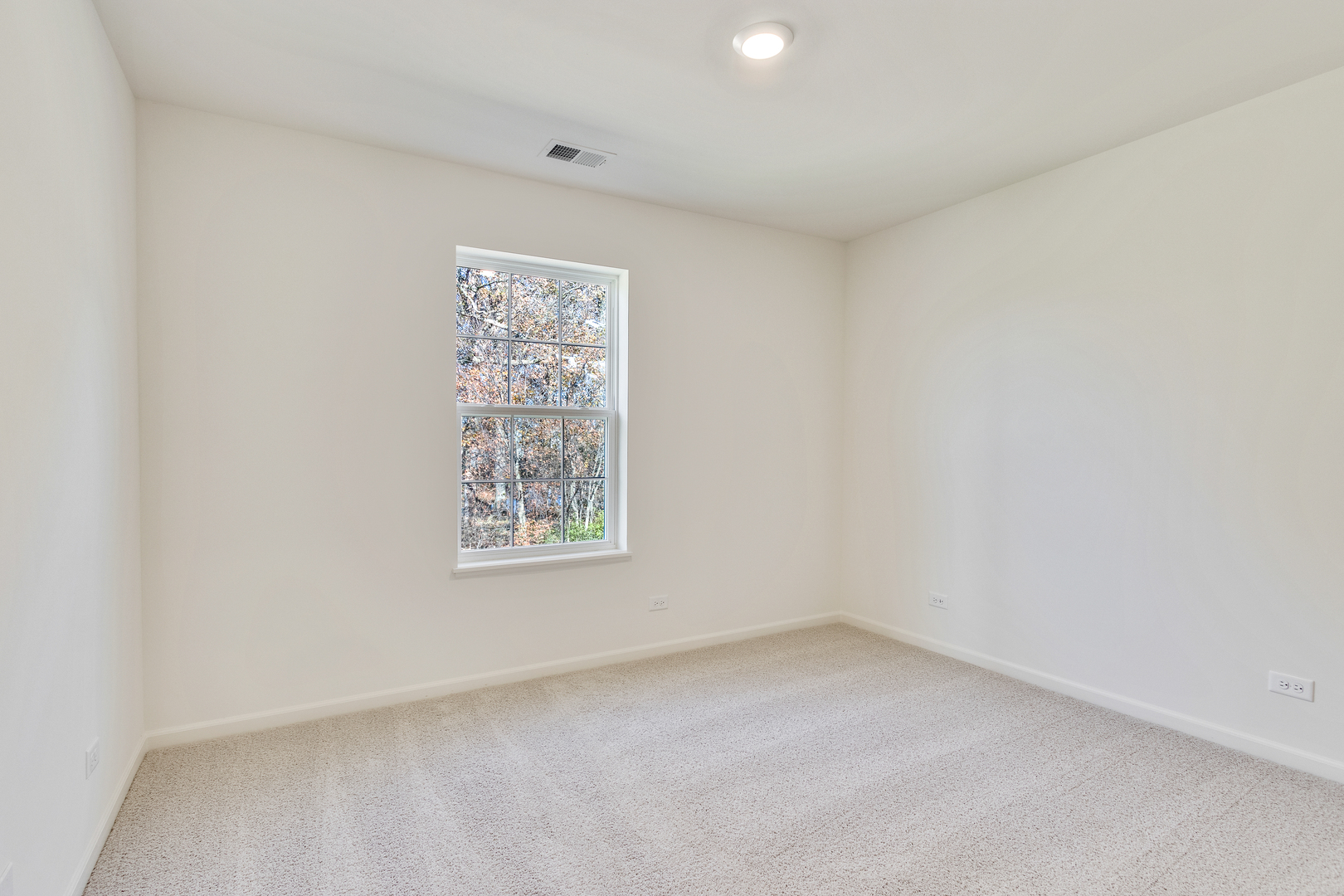 2065 Stuttle Road Batavia, IL 60510 - Photo 21 of 23 an empty room with a window