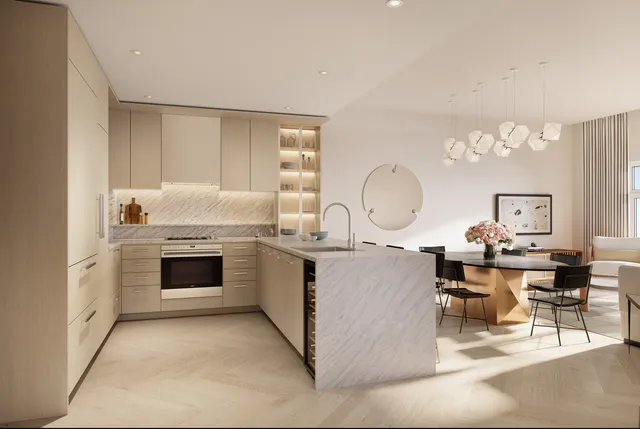 a kitchen with cabinets and window