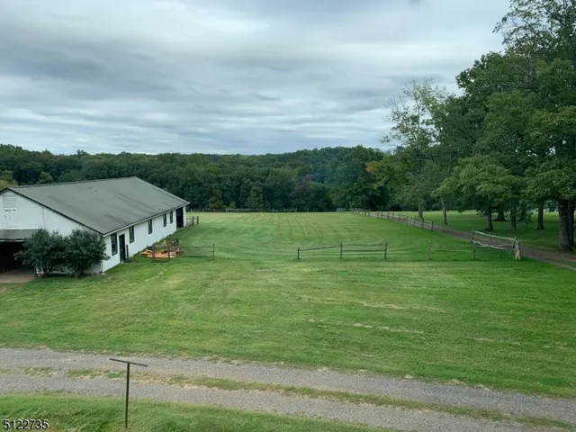 a view of a green field with clear sky