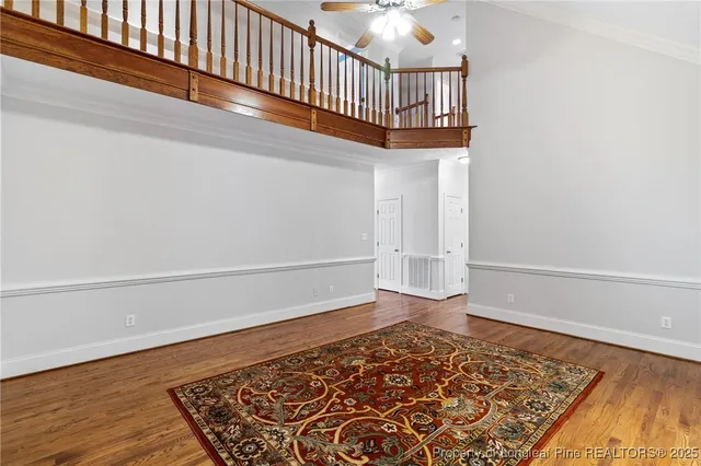 a view of staircase with white walls