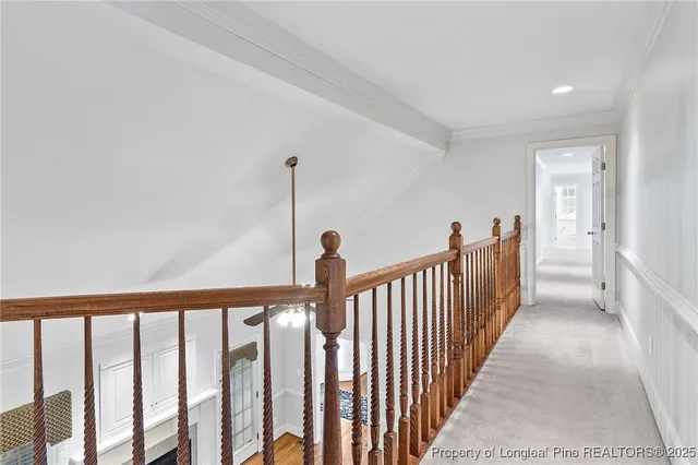 a view of a hallway with windows