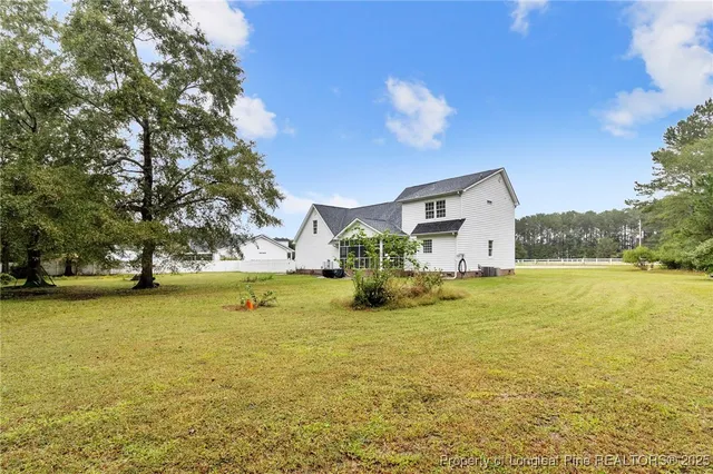 a view of a house with a ocean view