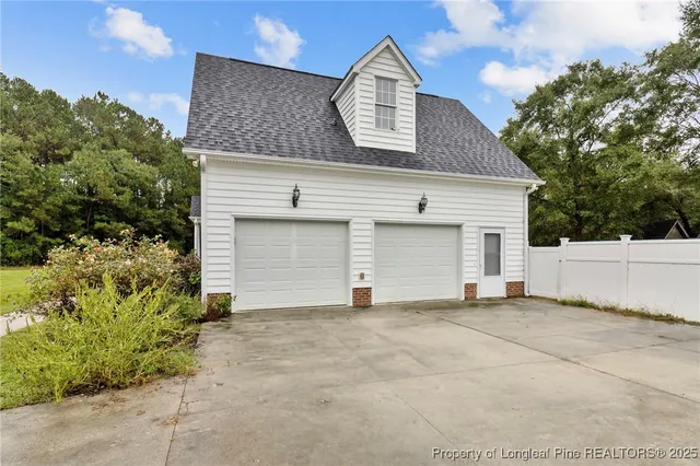 a view of a house with a garage