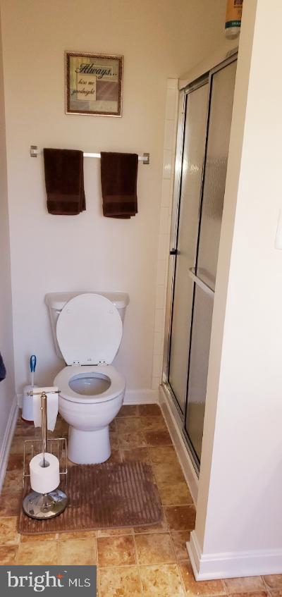 1810 Waltman Road Edgewood, MD 21040 - Photo 15 of 42 a bathroom with a toilet and a shower