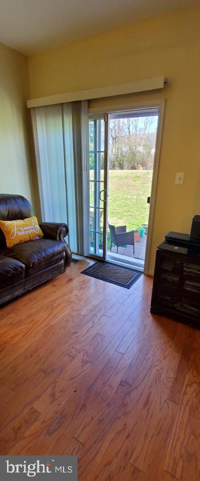 1810 Waltman Road Edgewood, MD 21040 - Photo 18 of 42 a living room with furniture and a large window