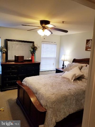 1810 Waltman Road Edgewood, MD 21040 - Photo 23 of 42 a bedroom with a bed and a dresser