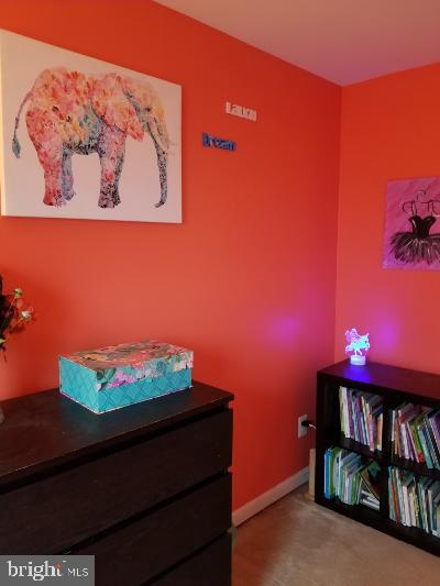 1810 Waltman Road Edgewood, MD 21040 - Photo 27 of 42 a room with table and potted plant