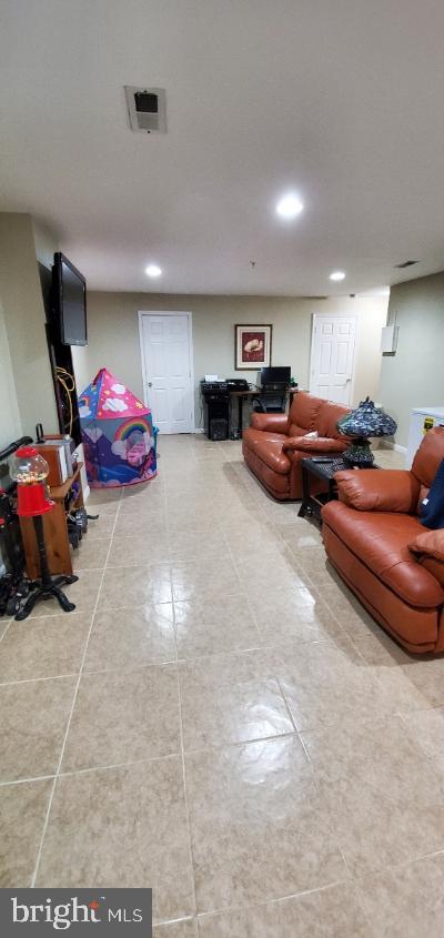 1810 Waltman Road Edgewood, MD 21040 - Photo 38 of 42 a living room with furniture and a couch