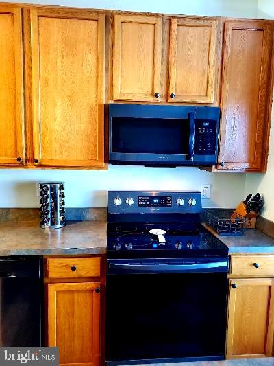 1810 Waltman Road Edgewood, MD 21040 - Photo 6 of 42 a kitchen with a stove and a sink