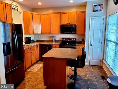 1810 Waltman Road Edgewood, MD 21040 - Photo 7 of 42 a kitchen with stainless steel appliances granite countertop a refrigerator a stove a sink and a microwave