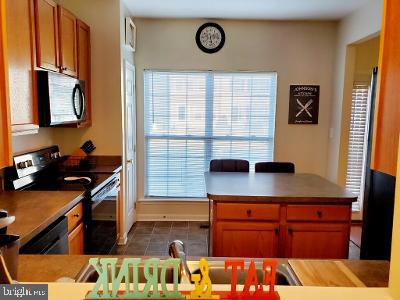 1810 Waltman Road Edgewood, MD 21040 - Photo 9 of 42 a kitchen with stainless steel appliances granite countertop a stove and a microwave