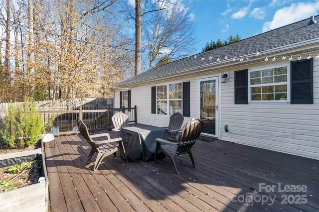 a view of a patio on wooden deck