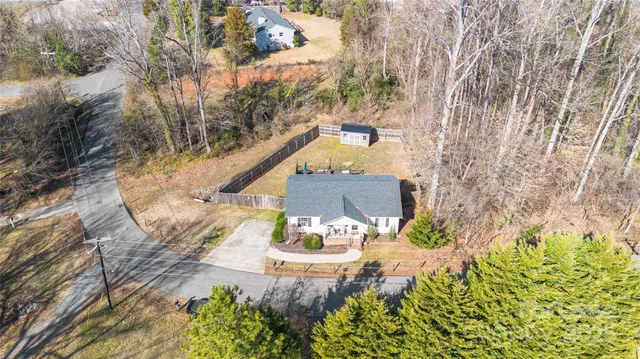 a view of a wooden floor and a yard