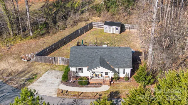 a view of swimming pool with a yard