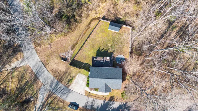 a front view of house with yard outdoor seating and green space