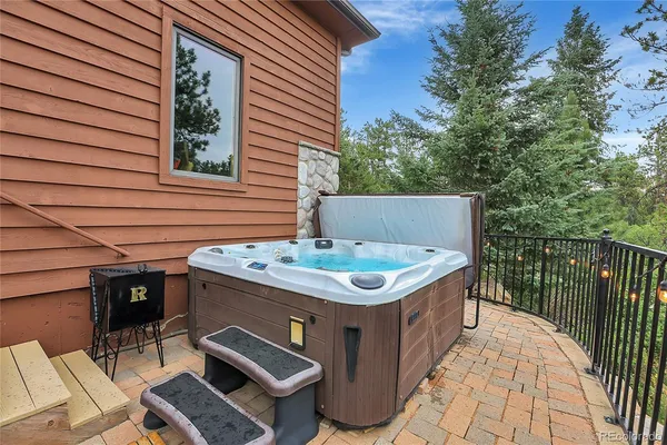 a view of swimming pool outdoor seating and nature