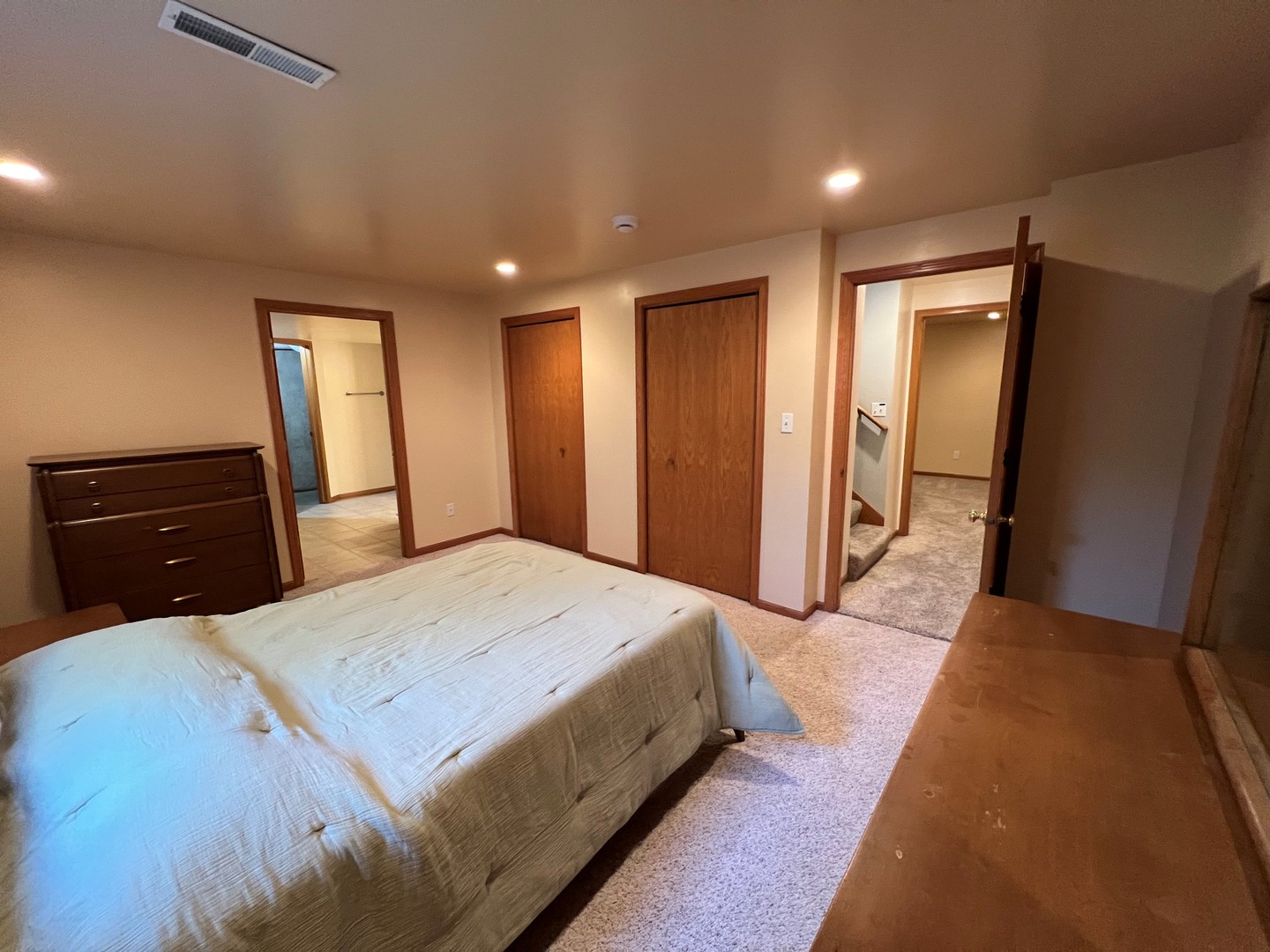 5770 South Indian Trail Rochelle, IL 61068 - Photo 13 of 21 a bedroom with a bed and a dresser