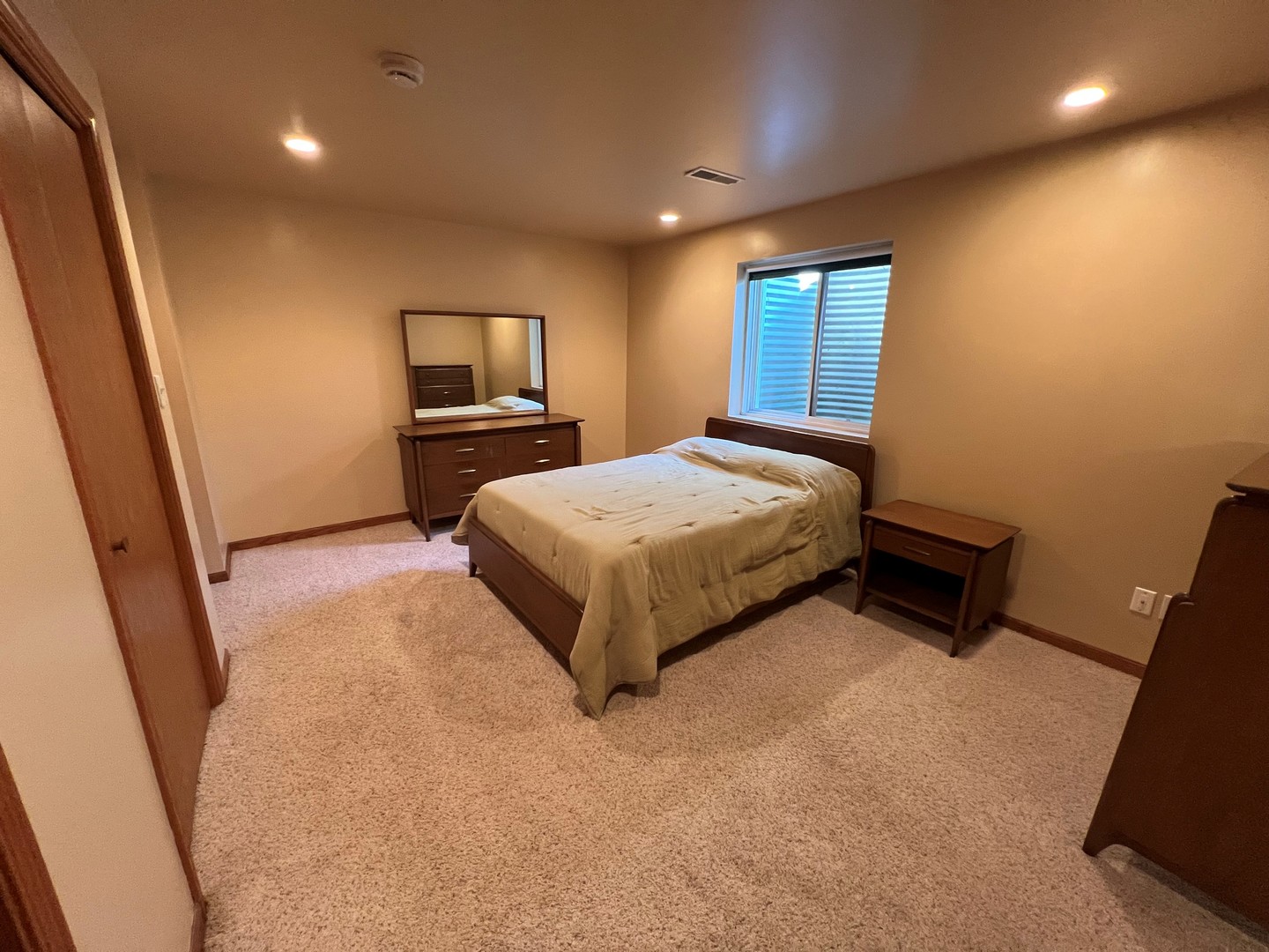5770 South Indian Trail Rochelle, IL 61068 - Photo 14 of 21 a bedroom with a bed and a window