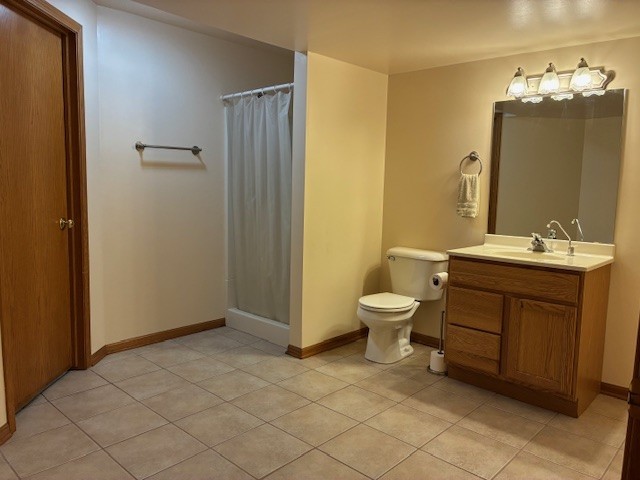 5770 South Indian Trail Rochelle, IL 61068 - Photo 15 of 21 a bathroom with a toilet sink and mirror