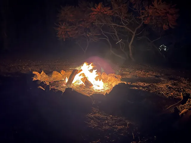 a sunset view with a lake