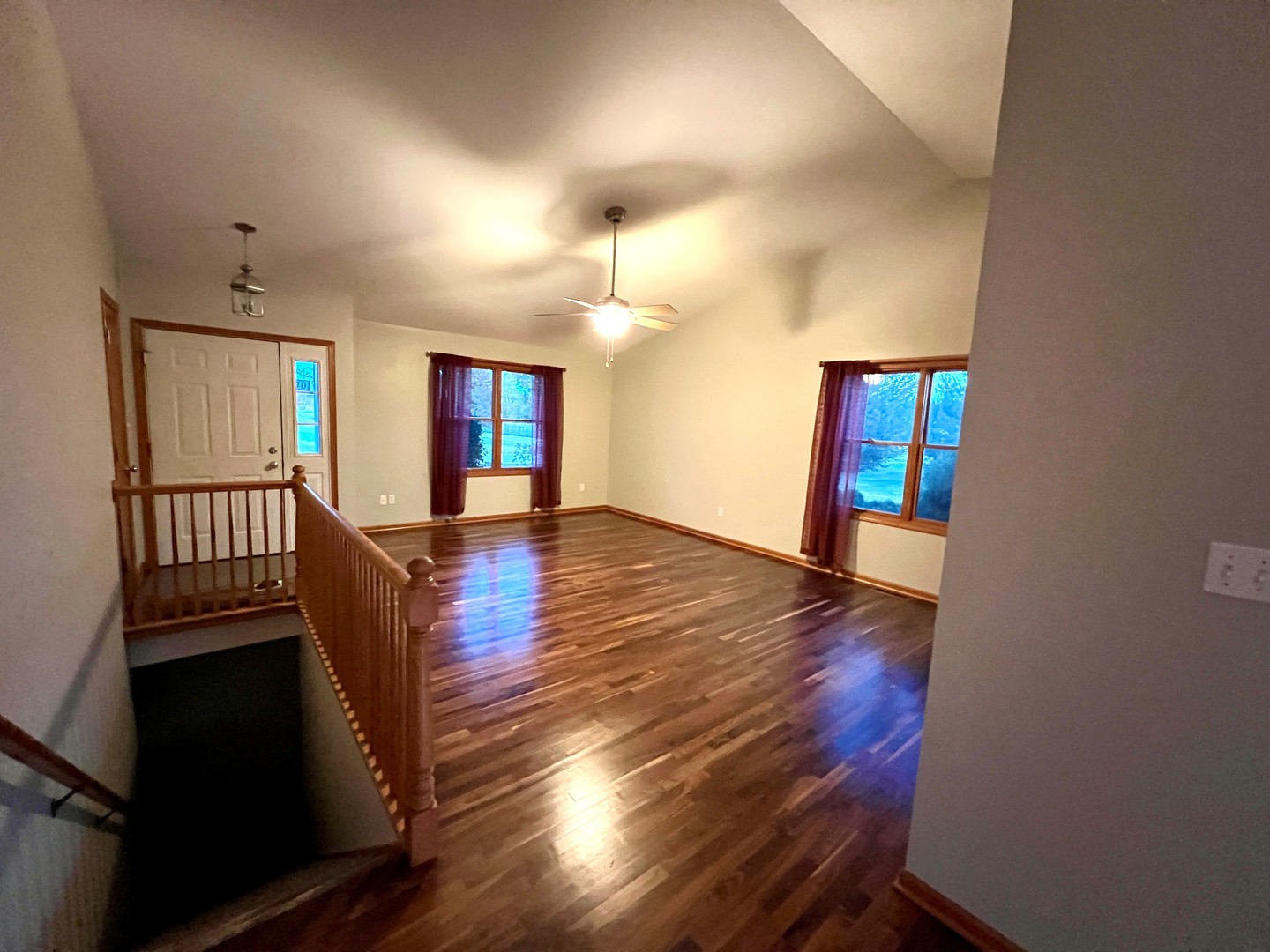 5770 South Indian Trail Rochelle, IL 61068 - Photo 5 of 21 wooden floor in an empty room with a window