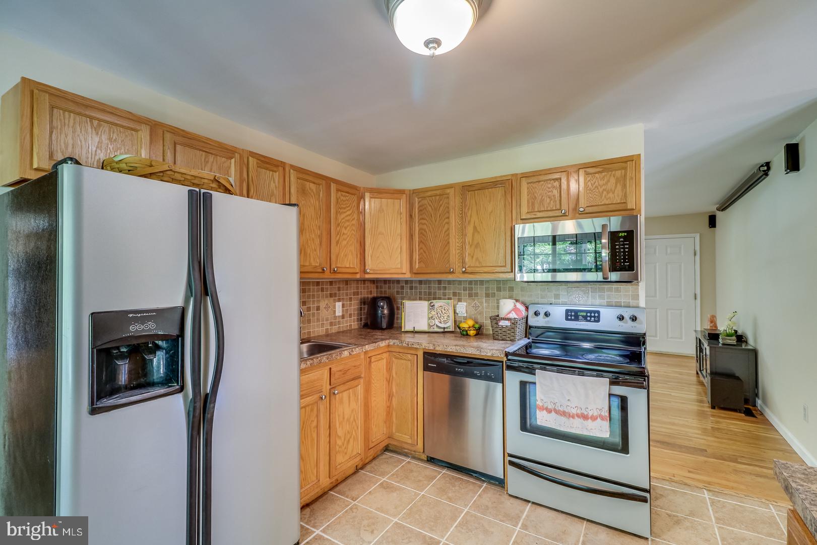 313 Alder Road Dover, DE 19904 - Photo 12 of 37 Kitchen w/ Stainless Steel Appliances