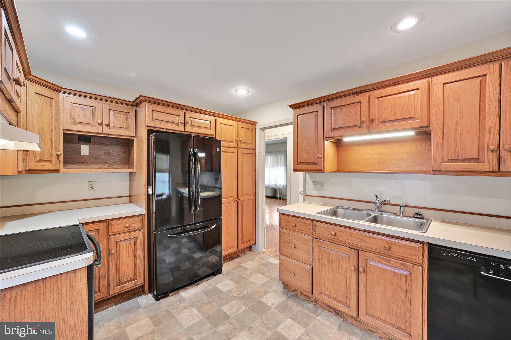 100 North Guthriesville Road Downingtown, PA 19335 - Photo 15 of 44 a kitchen with stainless steel appliances granite countertop a sink stove and refrigerator