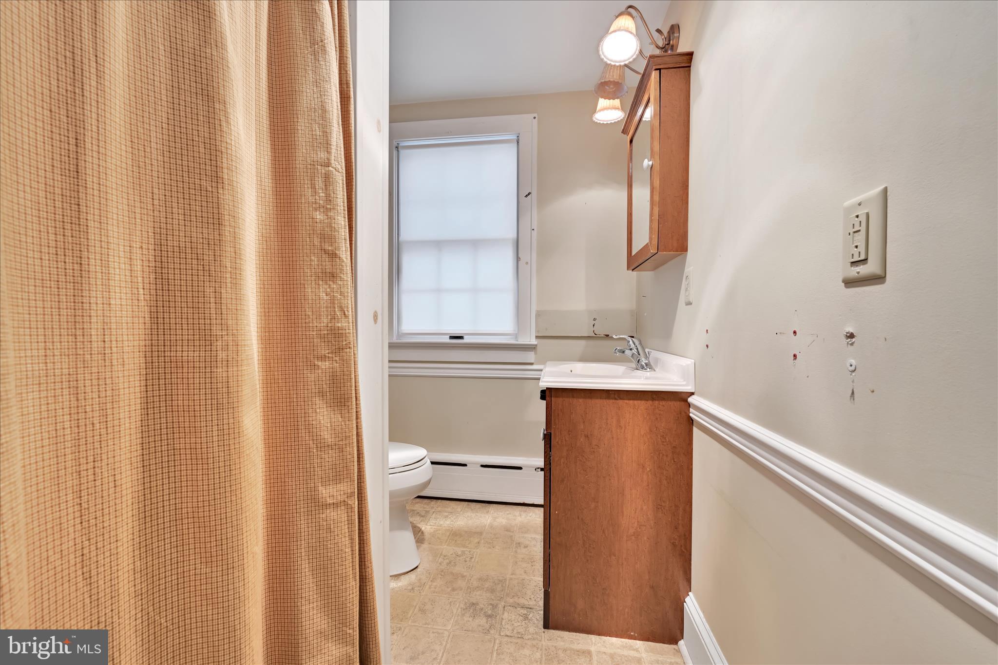 100 North Guthriesville Road Downingtown, PA 19335 - Photo 16 of 44 a bathroom with a granite countertop sink and a mirror