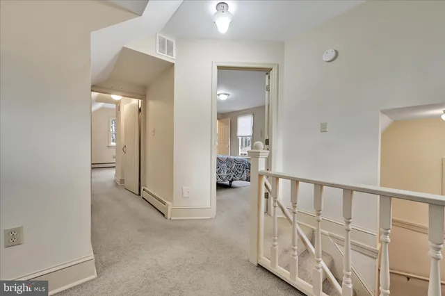 a view of a hallway with interior of the house