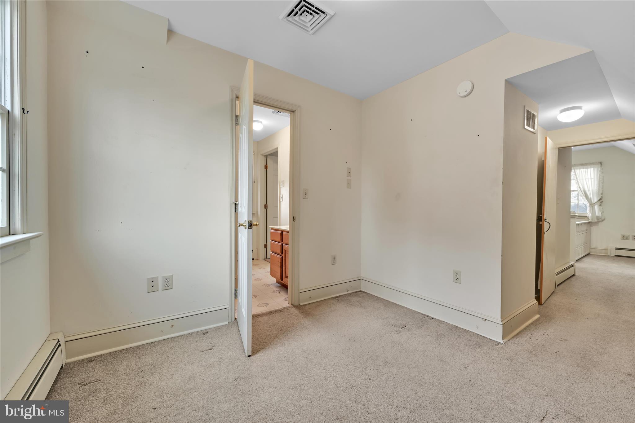 100 North Guthriesville Road Downingtown, PA 19335 - Photo 22 of 44 an empty room with mirror in it