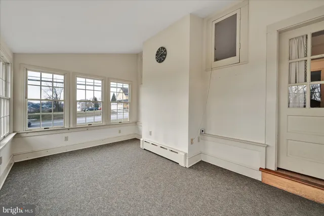 an empty room with windows