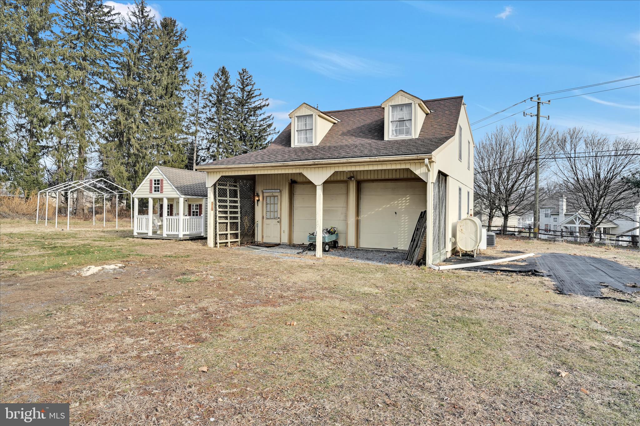 100 North Guthriesville Road Downingtown, PA 19335 - Photo 40 of 44 a front view of a house with a garden