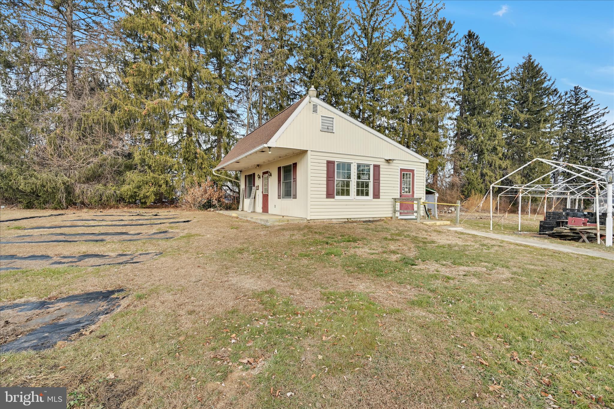 100 North Guthriesville Road Downingtown, PA 19335 - Photo 5 of 44 a front view of a house with a garden