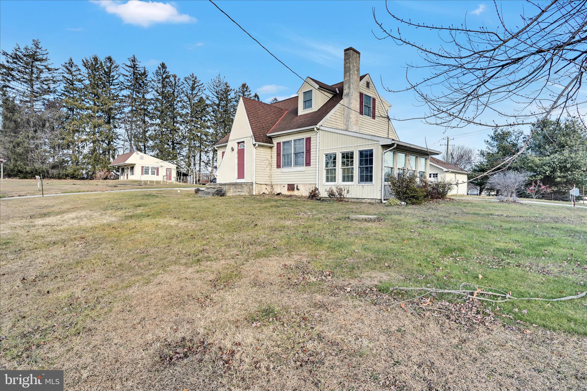 100 North Guthriesville Road Downingtown, PA 19335 - Photo 6 of 44 a front view of a house with a yard