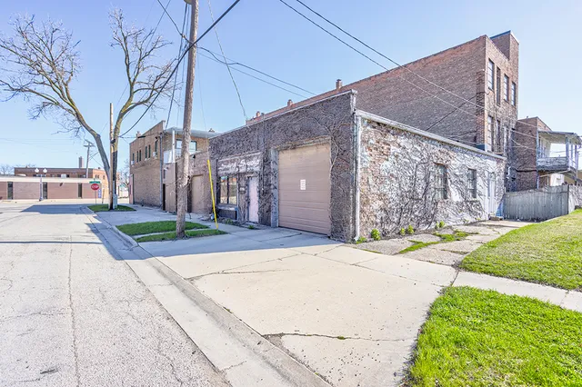 a hallway with furniture and a wooden floor