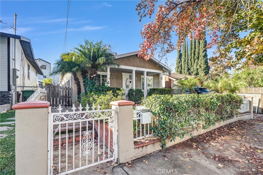 4816 Stratford Road Los Angeles, CA 90042 - Photo 3 of 20 a front view of a house with a garden