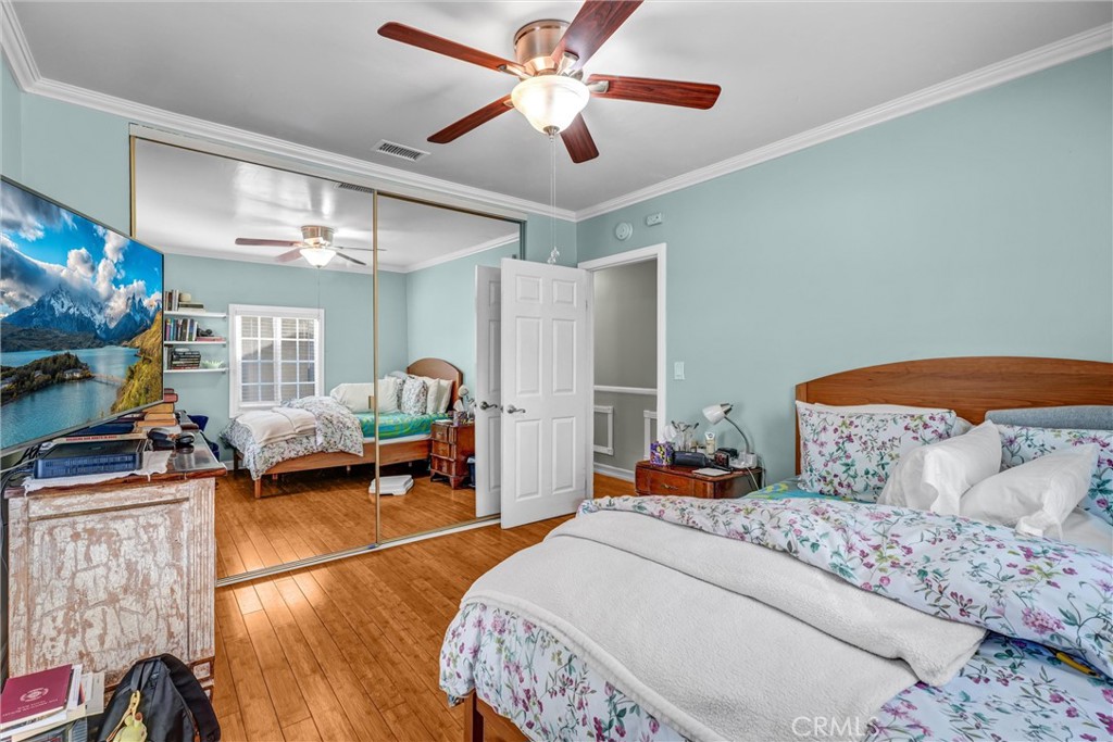 4816 Stratford Road Los Angeles, CA 90042 - Photo 10 of 20 a bedroom with bed and a chandelier