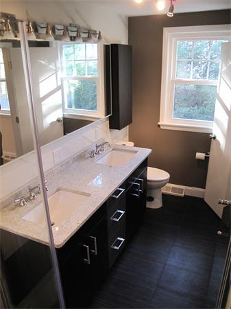 40 Grace Road Newton, MA 02459 - Photo 19 of 24 a bathroom with a sink vanity and a mirror