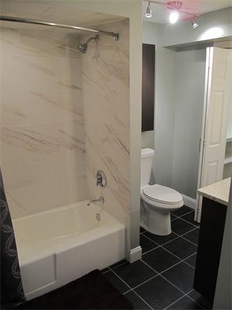 40 Grace Road Newton, MA 02459 - Photo 23 of 24 a bathroom with a toilet and a bathtub