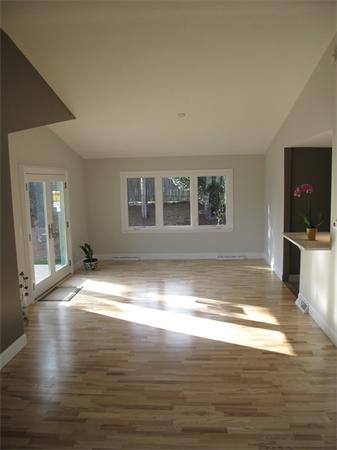 40 Grace Road Newton, MA 02459 - Photo 10 of 24 a view of empty room with kitchen and window