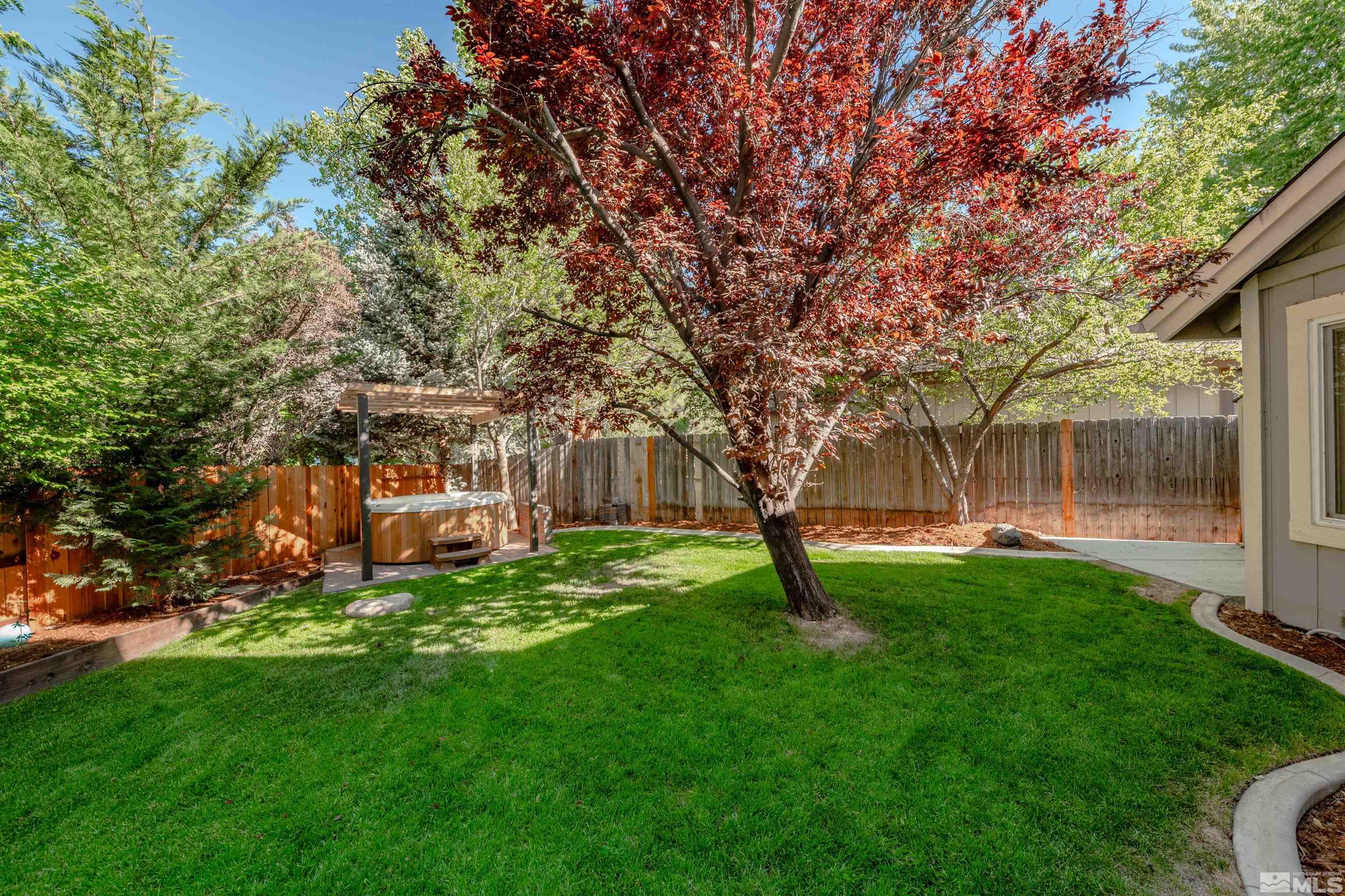 110 Riverhaven Place Reno, NV 89519 - Photo 35 of 40 a view of backyard with swimming pool