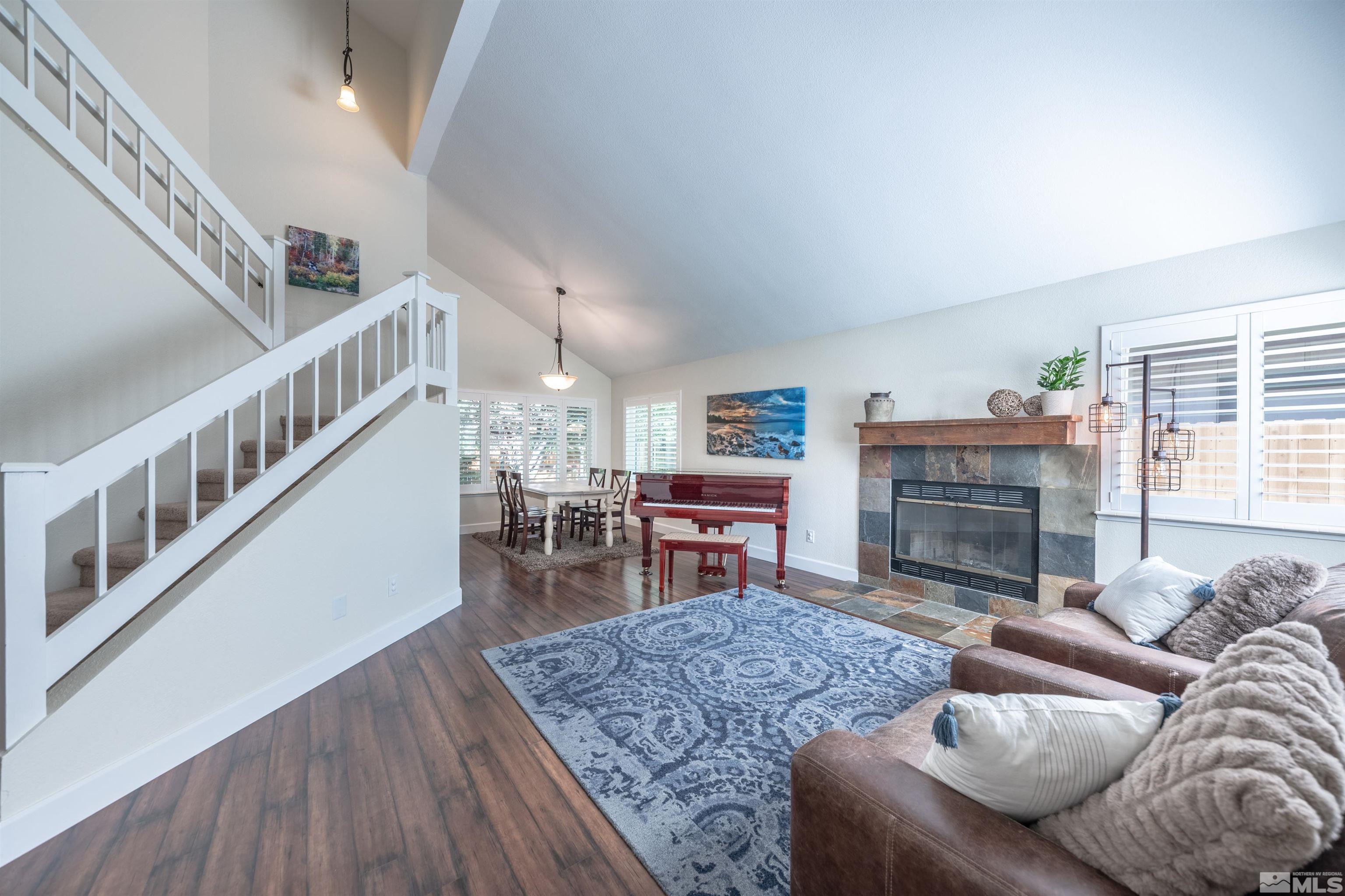 110 Riverhaven Place Reno, NV 89519 - Photo 5 of 40 a living room with furniture and a fireplace