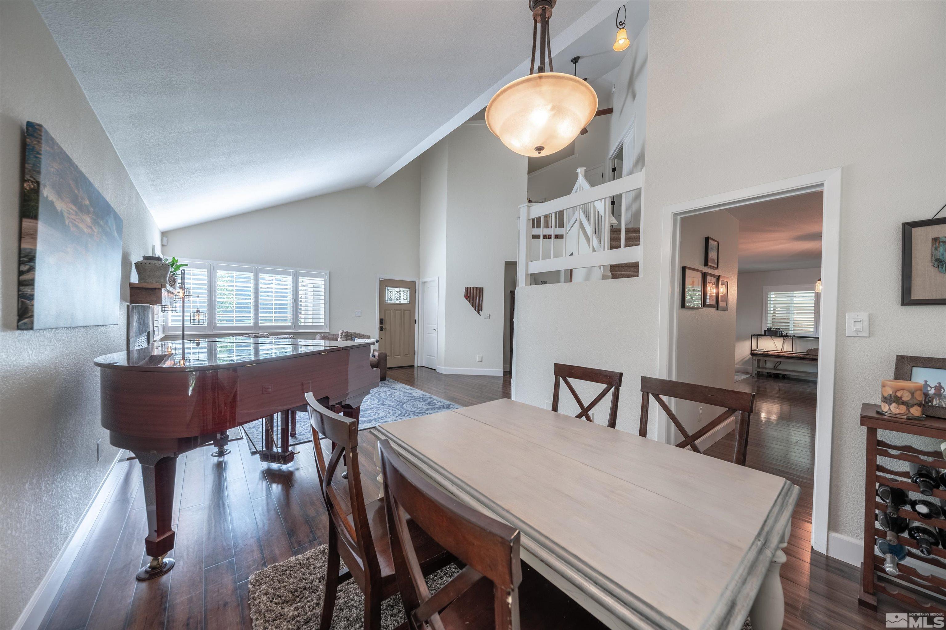 110 Riverhaven Place Reno, NV 89519 - Photo 8 of 40 a view of a dining room with furniture window and wooden floor