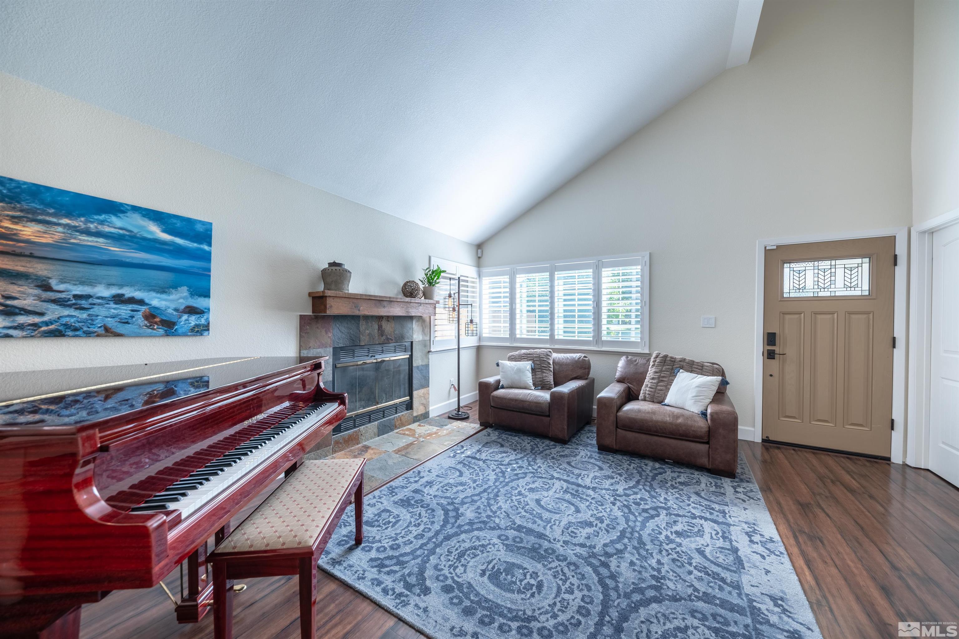 110 Riverhaven Place Reno, NV 89519 - Photo 10 of 40 a living room with furniture fireplace and window