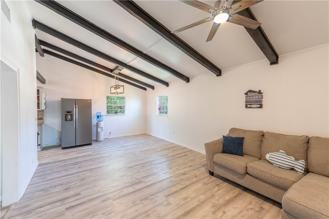132 Zenna Drive Mathis, TX 78368 - Photo 8 of 40 a living room with furniture and a ceiling fan